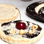 Receta de tartelettes de chocolate, frutos rojos y avellanas