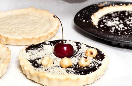 Receta de tartelettes de chocolate, frutos rojos y avellanas