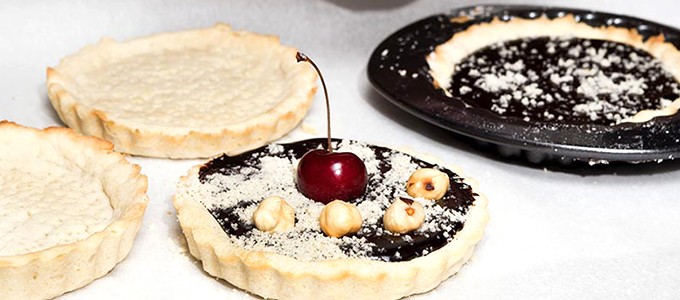 Receta de tartelettes de chocolate, frutos rojos y avellanas